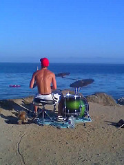 Drummer on a Santa Cruz Beach Cliff